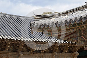 Roofs of Tongdosa Temple near Yangsan, South Gyeongsang Province, Korea. Inscription: é¾è¯æ®¿ `Maitreya Hall`